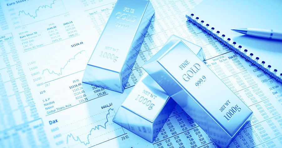 This image shows gold bars and is related to an article titled Best Time to Trade Gold in South Africa